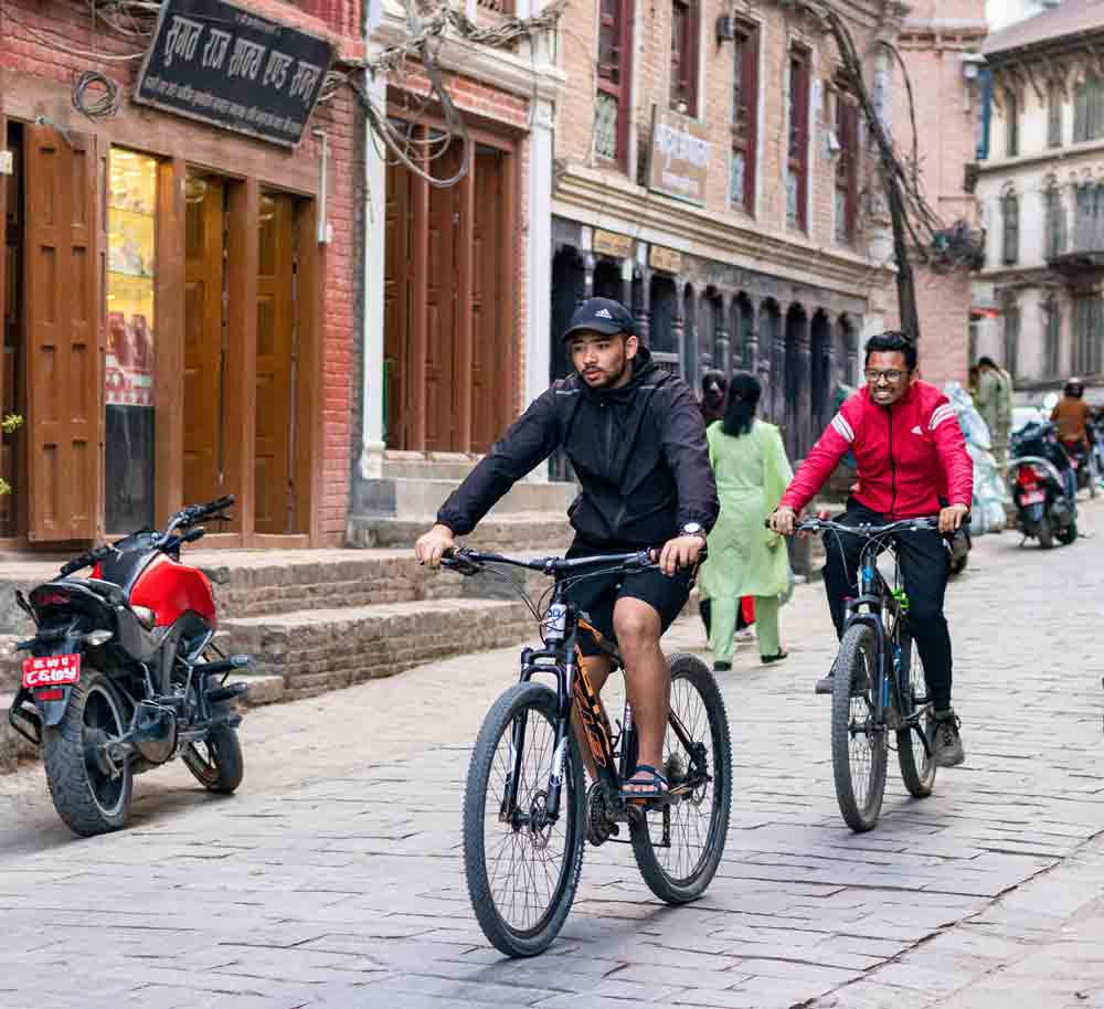 people riding bicycle in Cycle Connect Bhaktapur